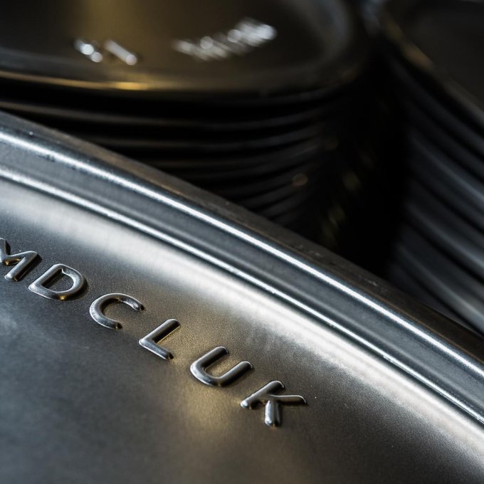 MDCLUK imprint on steel drum